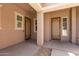 Covered entryway featuring decorative security doors, providing both style and security at 16785 W Montana De Oro Dr, Surprise, AZ 85387