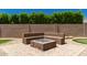 Custom stone fire pit with built-in seating, perfect for entertaining and outdoor living at 16785 W Montana De Oro Dr, Surprise, AZ 85387