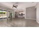 Spacious living room with tile floors, lots of natural light, and an open layout at 16785 W Montana De Oro Dr, Surprise, AZ 85387