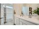 Bright bathroom featuring double sinks, shower/tub combo and modern fixtures at 16895 W Bronco Trl, Surprise, AZ 85387