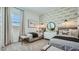Well-designed bedroom with two beds, stylish wallpaper, and neutral tones at 16895 W Bronco Trl, Surprise, AZ 85387
