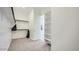 Spacious walk-in closet with shelves and hanging rods for ample storage at 16895 W Bronco Trl, Surprise, AZ 85387