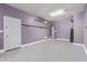 Spacious garage featuring ample room for parking and additional storage at 19022 W Shangri La Rd, Surprise, AZ 85388
