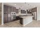 Modern kitchen with stainless steel appliances and stylish backsplash at 19022 W Shangri La Rd, Surprise, AZ 85388