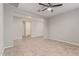 Cozy living room with open doorway and tile flooring at 19022 W Shangri La Rd, Surprise, AZ 85388