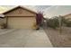 Charming home showcasing desert landscaping and a two-car garage at 2110 E Williams Dr, Phoenix, AZ 85024