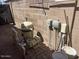 View of the pool equipment including the pump and filter, positioned against the wall for easy access and maintenance at 2110 E Williams Dr, Phoenix, AZ 85024