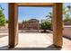 View of the backyard from the covered patio, featuring a swing set at 2177 W Agrarian Hills Dr, San Tan Valley, AZ 85144