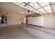 This spacious garage features epoxy floors, ample storage, and utility access at 2177 W Agrarian Hills Dr, San Tan Valley, AZ 85144