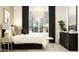 Bright bedroom featuring a large window, modern furnishings, and neutral decor at 25140 N 174Th Ave, Surprise, AZ 85387