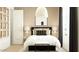 Inviting bedroom with a stylish black bed frame, pendant light, and coordinated decor at 25140 N 174Th Ave, Surprise, AZ 85387