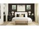 Serene main bedroom with neutral tones, stylish lighting, and modern decor at 25140 N 174Th Ave, Surprise, AZ 85387