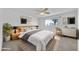 Serene main bedroom with a king-size bed, stylish decor, and natural light from the window at 2812 E Clarendon Ave, Phoenix, AZ 85016