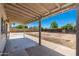 Expansive backyard with a covered patio, presenting a blank canvas for outdoor enjoyment and landscaping at 2941 W Michigan Ave, Phoenix, AZ 85053