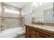 A bathroom featuring a vanity, a sink, and tile walls at 2941 W Michigan Ave, Phoenix, AZ 85053