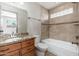 A bathroom with a vanity, shower and a sink at 2941 W Michigan Ave, Phoenix, AZ 85053