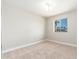 Bedroom with carpet and a bright window at 2941 W Michigan Ave, Phoenix, AZ 85053