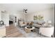 Cozy living room featuring stylish seating, a ceiling fan, and eye-catching decor at 2941 W Michigan Ave, Phoenix, AZ 85053