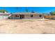 Backyard of a well-maintained house with a covered patio, offering an inviting outdoor living space at 2941 W Michigan Ave, Phoenix, AZ 85053