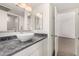 Modern bathroom features a vessel sink, and a door which leads to another room, for added convenience at 3039 W Ross Ave, Phoenix, AZ 85027