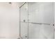 Bright bathroom shower featuring modern fixtures and white tile, providing a clean and functional space at 3039 W Ross Ave, Phoenix, AZ 85027