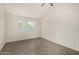 Spacious bedroom featuring tile floors, a window, and neutral paint, perfect for creating a personalized oasis at 3039 W Ross Ave, Phoenix, AZ 85027