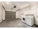 Functional garage featuring laundry, ample storage space and access to parking your vehicle at 3039 W Ross Ave, Phoenix, AZ 85027