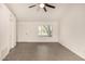Bright living room featuring tile flooring, ample natural light, and neutral paint at 3039 W Ross Ave, Phoenix, AZ 85027