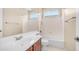 Bathroom with a single sink vanity, a toilet, and a shower-tub combo at 3439 W Darien Way, Phoenix, AZ 85086