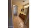Bathroom with double vanity and a walk-in closet featuring wire shelving at 40504 N Las Praderas St, San Tan Valley, AZ 85140