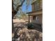 Home exterior with desert landscaping and a covered front porch at 40504 N Las Praderas St, San Tan Valley, AZ 85140