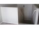 Stairway with white walls leading to the upper floor at 40504 N Las Praderas St, San Tan Valley, AZ 85140
