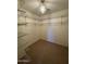 Walk-in closet fitted with wire shelving and carpeted floor at 40504 N Las Praderas St, San Tan Valley, AZ 85140