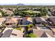 Aerial view of a home with a pool and mature landscaping in a Gathering-friendly neighborhood at 4140 E Claxton Ave, Gilbert, AZ 85297