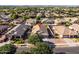 This is an aerial view of a well maintained home in a neighborhood setting at 4140 E Claxton Ave, Gilbert, AZ 85297