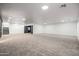 Large carpeted basement featuring recessed lighting and great space for entertaining at 4140 E Claxton Ave, Gilbert, AZ 85297