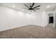 Bright bedroom features plush carpeting, recessed lighting, ceiling fan and a closet with sliding doors at 4140 E Claxton Ave, Gilbert, AZ 85297