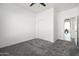 Inviting bedroom with soft carpet, ceiling fan and closet for organized storage at 4140 E Claxton Ave, Gilbert, AZ 85297