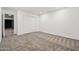 Neutral bedroom features plush carpeting, recessed lighting, and closet with sliding doors at 4140 E Claxton Ave, Gilbert, AZ 85297