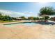 Stunning community pool with lounge seating and umbrellas provides a resort-like atmosphere at 4140 E Claxton Ave, Gilbert, AZ 85297