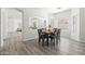 Elegant dining area with a stylish table setting and connecting living spaces at 4140 E Claxton Ave, Gilbert, AZ 85297