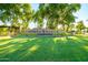 Lush green lawn and landscaping at Power Ranch community entrance sign at 4140 E Claxton Ave, Gilbert, AZ 85297