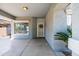 Covered entryway featuring stylish front door with security features at 4140 E Claxton Ave, Gilbert, AZ 85297
