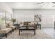 Comfortable living room featuring neutral tones, soft seating, and natural light at 4140 E Claxton Ave, Gilbert, AZ 85297