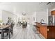 Open concept living area showcasing a modern kitchen and inviting living room at 4140 E Claxton Ave, Gilbert, AZ 85297