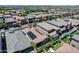 Desirable aerial view highlighting a neighborhood with solar panels, beautiful landscaping, and community appeal at 4630 E Navigator Ln, Phoenix, AZ 85050