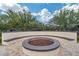Cozy outdoor fire pit area with built-in seating, ideal for gathering and enjoying cool evenings at 4630 E Navigator Ln, Phoenix, AZ 85050