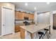 Large kitchen island with granite countertop seating provides ample workspace and a breakfast bar at 4630 E Navigator Ln, Phoenix, AZ 85050