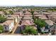 Overview of residential neighborhood with well-maintained homes and lush landscaping, situated in a vibrant and Gathering-friendly community at 4743 E Laurel Ave, Gilbert, AZ 85234