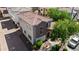 Aerial shot of a two-story home with a tile roof, manicured landscaping, and a private driveway, exhibiting modern architecture at 4743 E Laurel Ave, Gilbert, AZ 85234